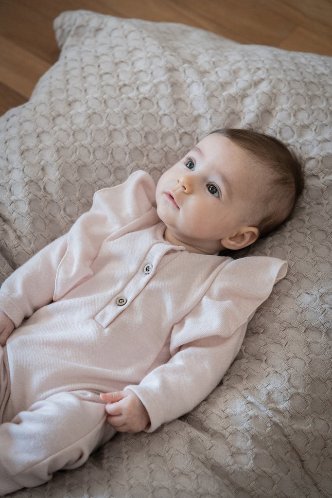 Guida alla scelta delle tutine per neonati